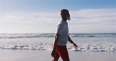 Senior African American Man Walking At Beach Stock Footage SBV-346605958 - Storyblocks