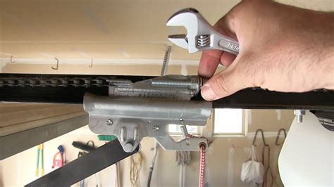 How to tighten a loose sagging Chain - Garage Door Opener repair - YouTube