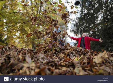 Kids Jumping Leaves Stock Photos & Kids Jumping Leaves Stock Images - Alamy