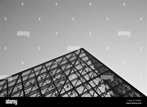 Simple design of Louvre Pyramid - Louvre Museum, Paris Stock Photo - Alamy