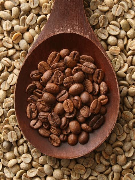 Raw And Roasted Coffee Beans Photograph by Fotografiabasica - Pixels