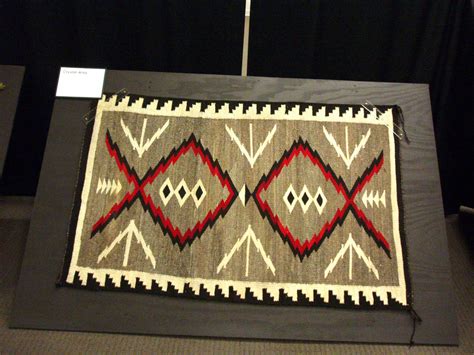 History and Culture by Bicycle: RISING FROM TRADITION NAVAJO RUGS 1900-1977