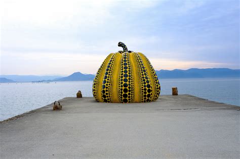 Say Hi To | On an old pier on Naoshima Island, Japan, Yayoi Kusama's largest Pumpkin sculpture ...