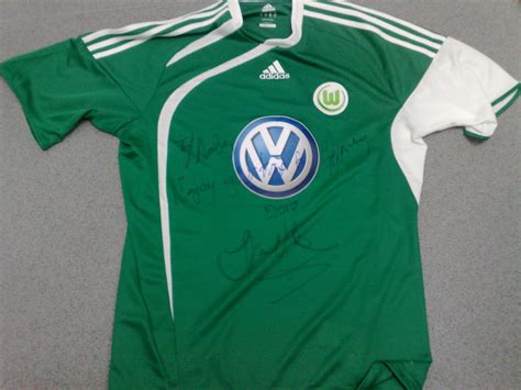 VfL Wolfsburg Away football shirt 2009 - 2010. Sponsored by Volkswagen