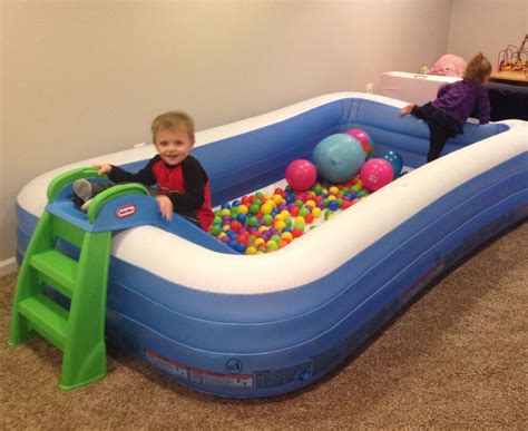 Playroom ball pit with slide. I am so doing this in the wintertime!! so ...