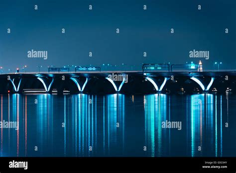 The Woodrow Wilson Bridge at night, seen from National Harbor, Maryland ...