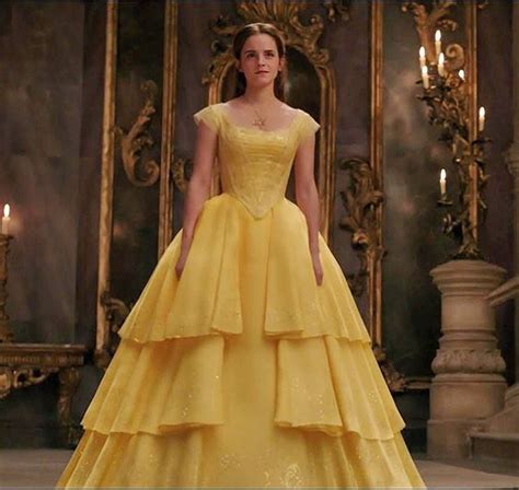 First Look At Emma Watson As Belle In Iconic Yellow G - vrogue.co