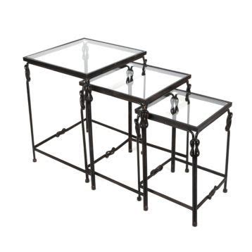 two tables with glass tops and metal legs