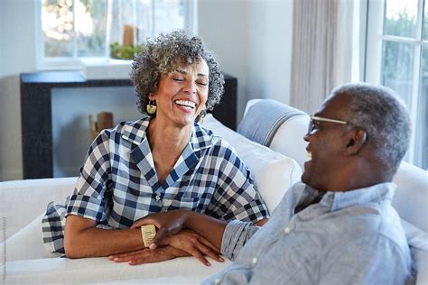 "African American Senior Couple Laughing And Having A Good Time Together At Home" by Stocksy ...