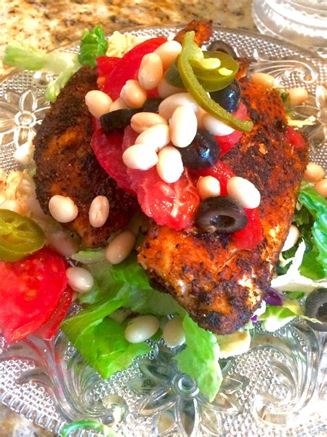 blackened tilapia salad with fresh tomatoes, beans , olives and creamy ...