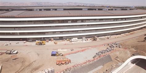 Apple's new headquarters was supposed to wrap up landscaping last m...