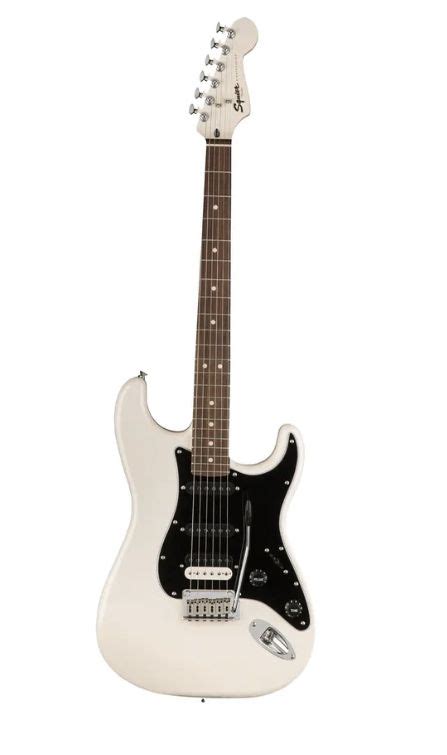 an electric guitar that is white and black