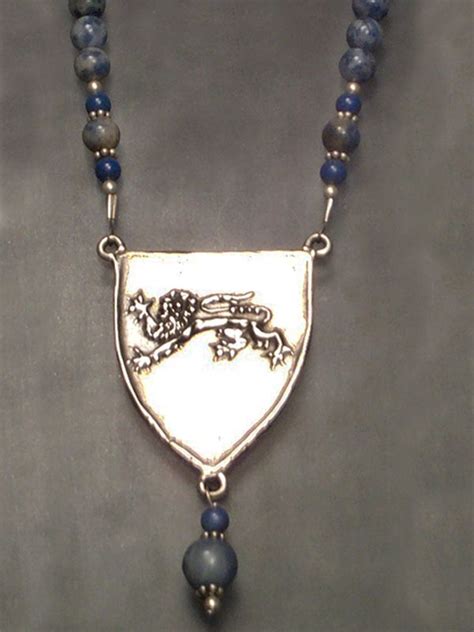 Orig waxes. Lion passant, or English Lion, cast in sterling silver. With blue sodalite. | Heart ...