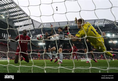 Arsenal goalkeeper Aaron Ramsdale saves from Liverpool's Ibrahima Konate late in the game during ...