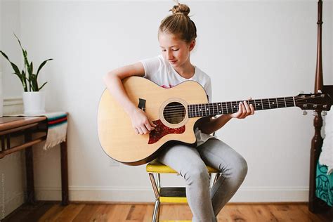 Little Girl Playing Guitar