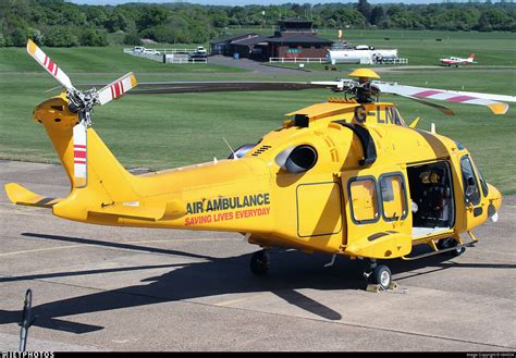 One of three Air Ambulance helicopters on site today (G-KSSC / G-KSSA also present).. G-LNAC ...