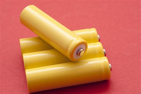 Free Stock image of Four unlabeled yellow batteries | ScienceStockPhotos.com