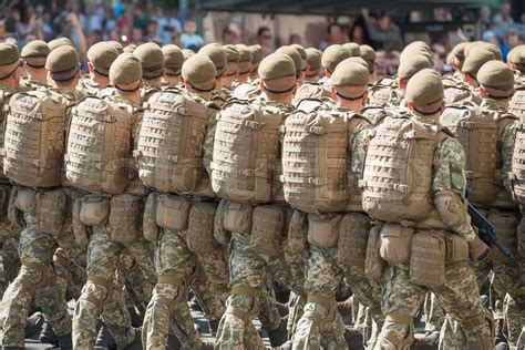 Army soldiers marching on military parade | Stock image | Colourbox