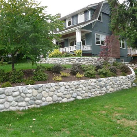 river rock retaining wall but with bigger stones, more loosely formed, and in tan tones | River ...