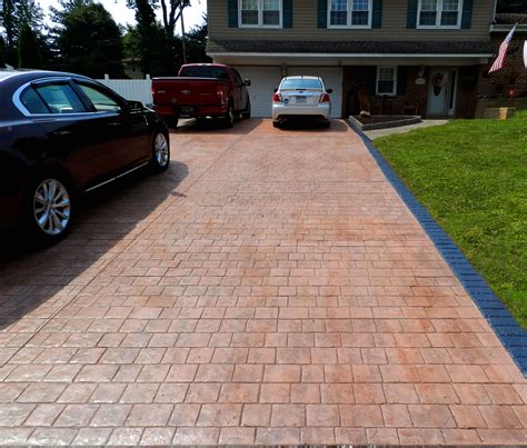 Stamped Concrete Driveway (Cobble Stones Pattern) with Brick Soldier Style Border. | Stamped ...