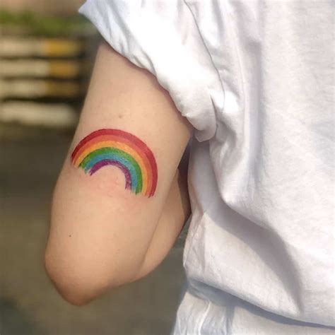 23 Rainbow Tattoo Design Examples for Pride Month and Beyond | Rainbow tattoos, Tattoo designs ...