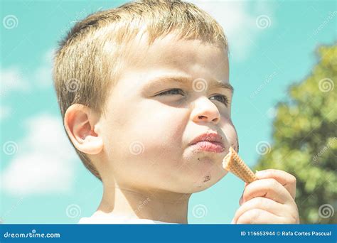 Close-up of a Child Eating an Ice Cream Cone Stock Photo - Image of tasty, childhood: 116653944