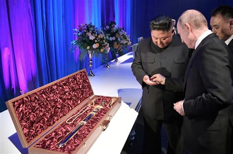 Kim Jong Un, Vladimir Putin exchange swords as dueling gifts