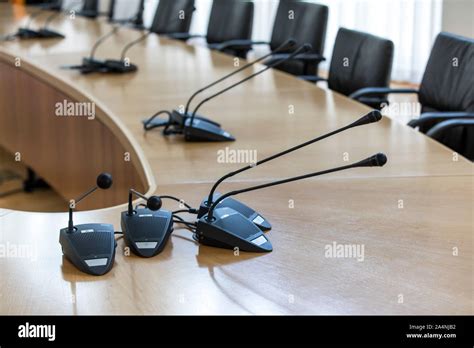 Conference technology, microphones on a conference table, in a ...