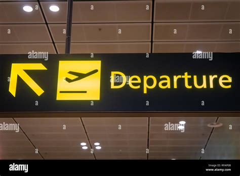 Airport departure signboard and icon - international flight departure information sign at ...