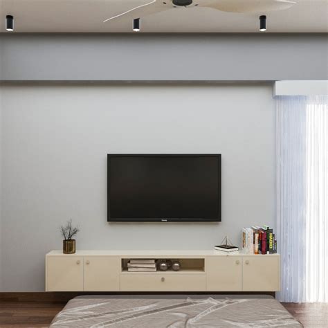 Compact Cream Toned TV Unit Design | Livspace