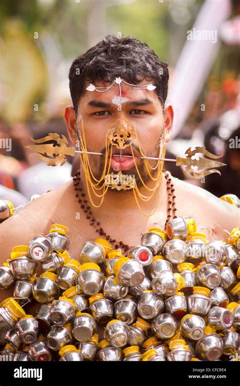 Mortification of the flesh, body piercing of Thaipusam Malaysia in Penang, 2011 Stock Photo - Alamy