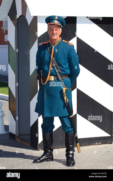 Guard in a 20th century Russian military uniform at the main entrance ...