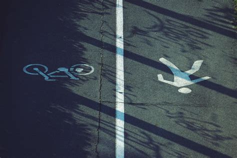 Bicycle and pedestrian road sign on the road 2106174 Stock Photo at ...