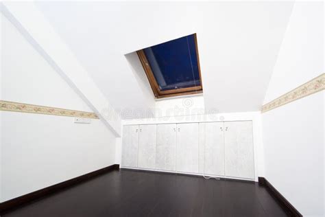 Attic Room with Roof Skylight Window Stock Photo - Image of hardwood, furniture: 16176096