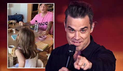 Robbie Williams' daughter Teddy adorably sings Angels but makes daddy howl after mixing up ...