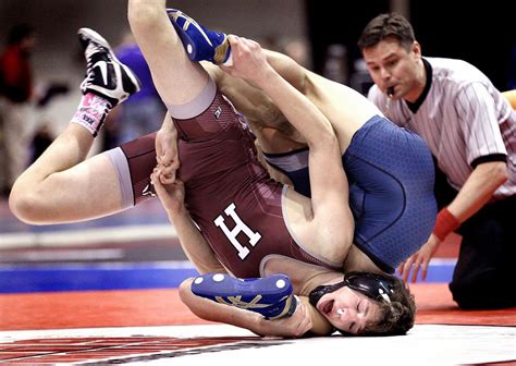 High school wrestling: Holmen's Brett Davis balances team, individual ...