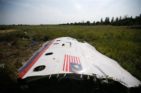 Haunting Photos From Malaysian Airlines Crash Site - Business Insider