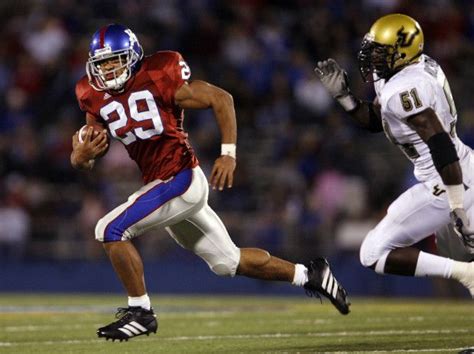 Kansas Jayhawks football uniforms--silver pants, red jersey, blue ...