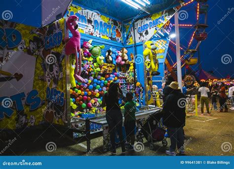 County Fair at Night, Games on the Midway Editorial Photo - Image of ...