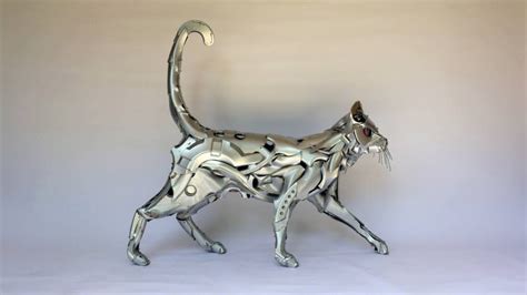 Metal Cat Sculpture by Hubcap Creatures #biomechanical | Artisti