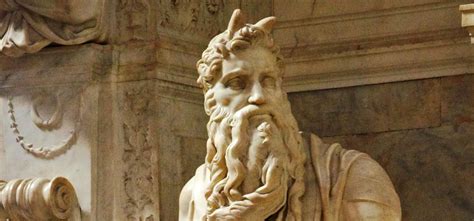 Why is Moses pictured with horns by famous artists?