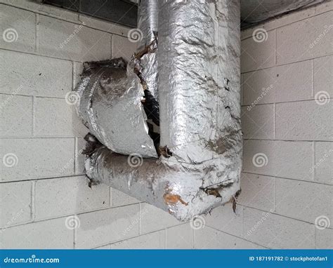 Silver Foil Insulation on Duct Work with Wall Stock Photo - Image of ...