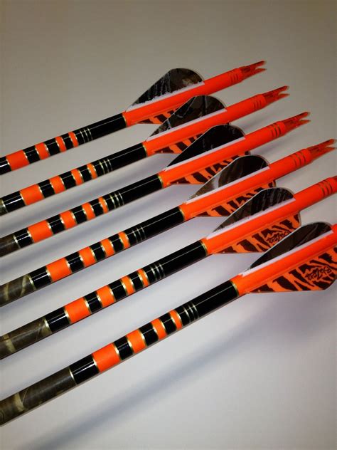 Custom black and flo orange Gold Tip custom arrows | Archery bows, Archery arrows, Archery ...