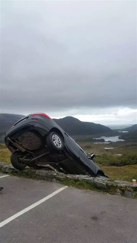 Incredible pictures of car dangling off a cliff at tourist hotspot in Kerry - Irish Mirror Online