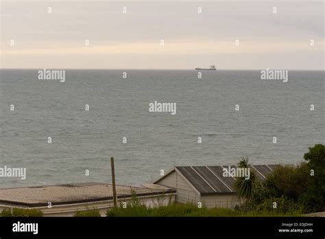 Large ship in sea passing Gunwalloe beach in Gunwalloe, Cornwall, England Stock Photo - Alamy