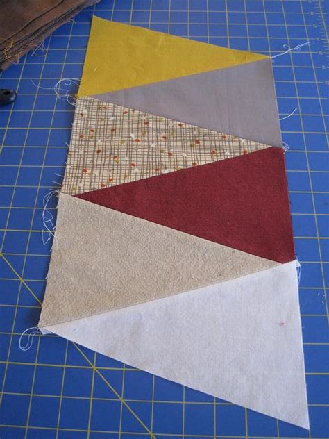 Scrappy triangle quilt - tips for sewing perfect triangles (which means perfect blocks ...