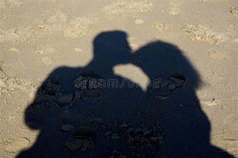 Shadow of kissing couple stock photo. Image of cuddling - 34360728