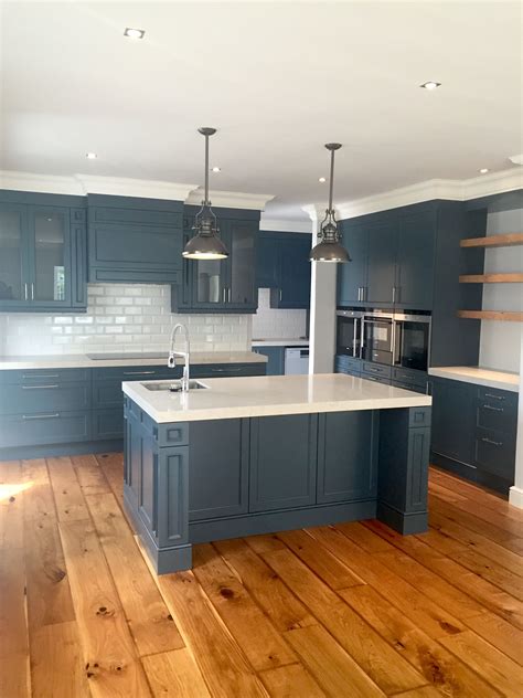 Beautiful kitchen in slate grey with Ceasarstone Bianco Drift counter tops, Franke taps, bevele ...