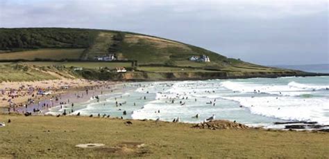 Surfing at Croyde Bay Devon - Ruda Holiday Park - Parkdean | Dorset england, Parkdean resorts ...