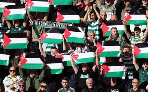 Celtic fans resist club by waving dozens of Palestine flags